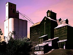 Grass Valley grain elevator in summer sunset