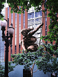 Hammered Copper statue resting on the City of Portland's Seal; Sculpture=Raymond Kaskey, 1985