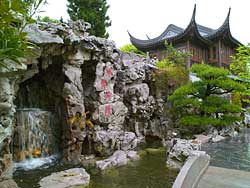 Waterfall foreground and Tower of Cosmic Reflections background