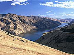 road near Snake River; reservoir of Brownlee Dam