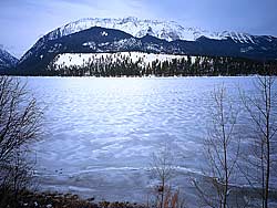 Crisp ice completely covers Wallowa Lake in winter (Joseph, Oregon)