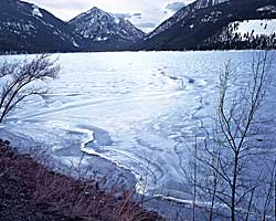 ice patterns in Wallowa Lake foreground to Mt Howard