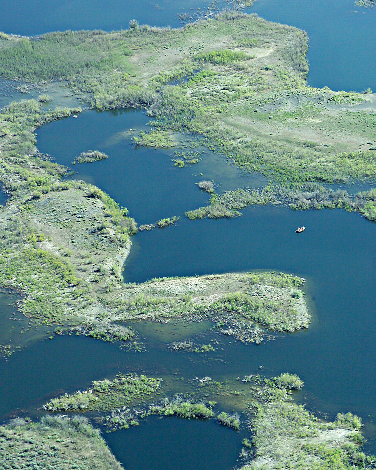 Buy this Can you see the tiny fishing boat on the far right? picture