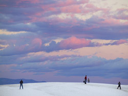 Tourists are encouraged to walk on the soft desert sand of White Sands National Monument